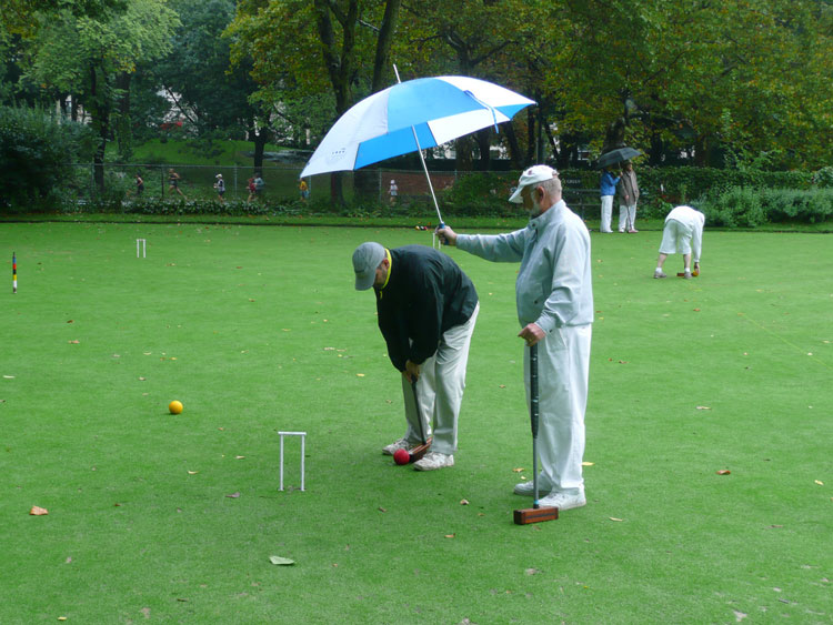 Croquet. Croquet in the rain. This picture was taken at the New York Croquet Club, in New York City, USA, 2009. .